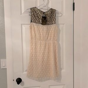 Mimi Chica Cream and black lace dress with gold sequins. Eyelet back.